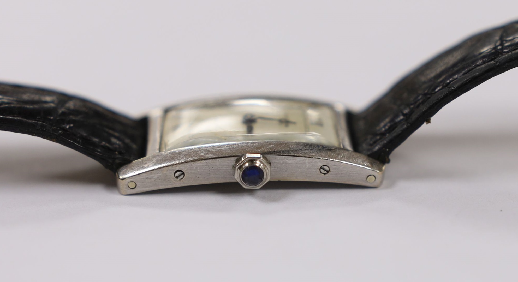 A 1920's 18ct white gold Cartier Tank Cintree (7 lignes model) manual wind wrist watch